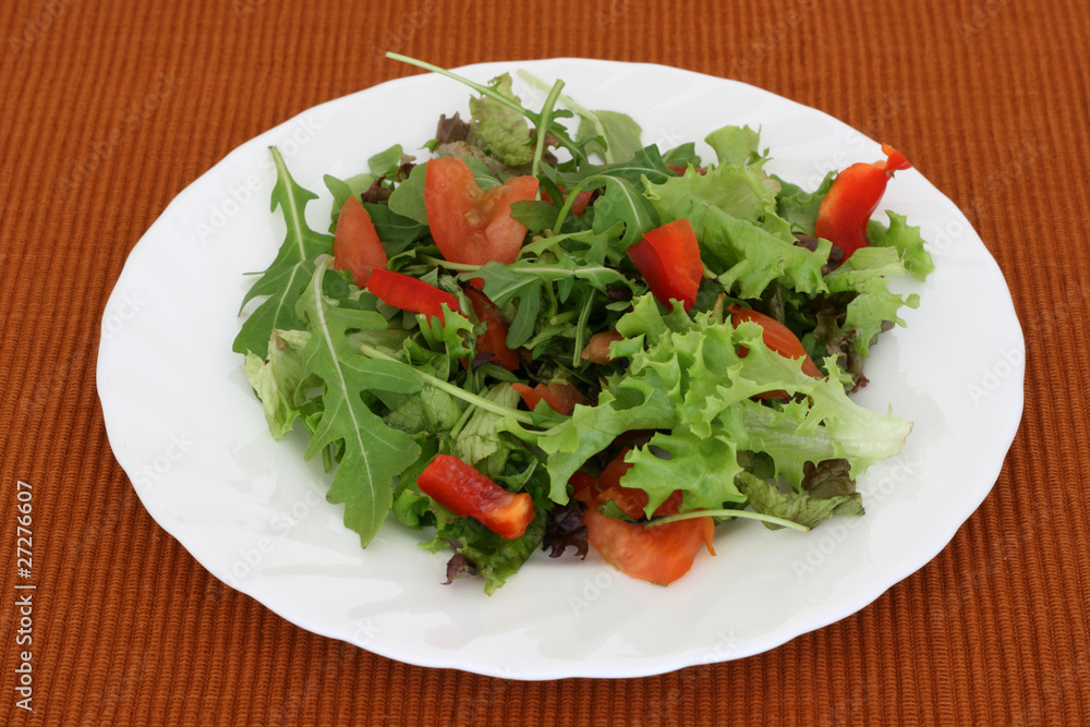 salad on an white plate salad on an white plate