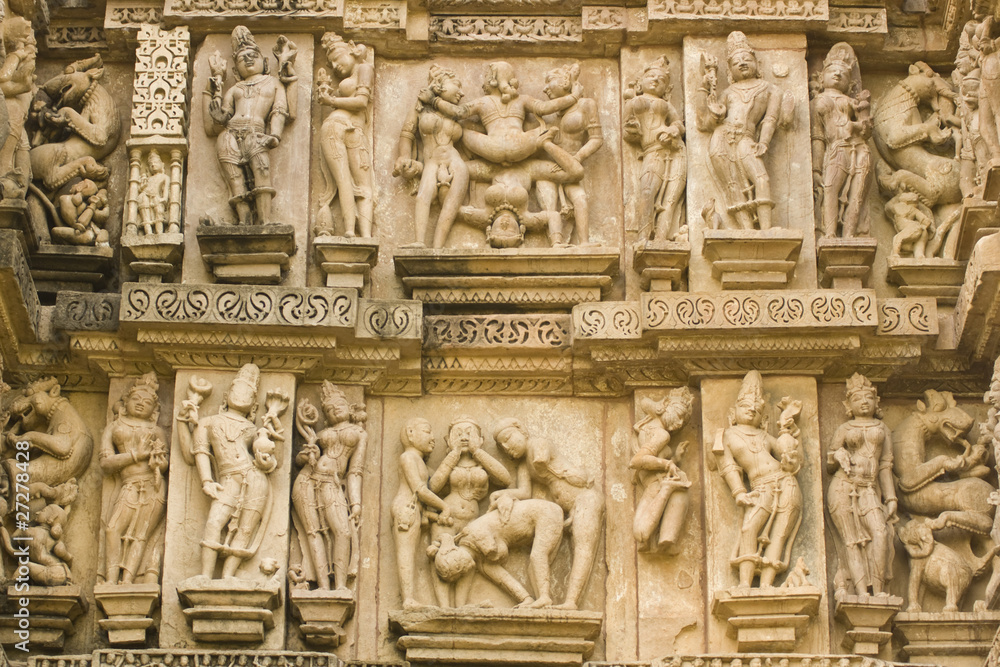 Erotic sculptures on ancient Hindu Temple at Khajuraho, India