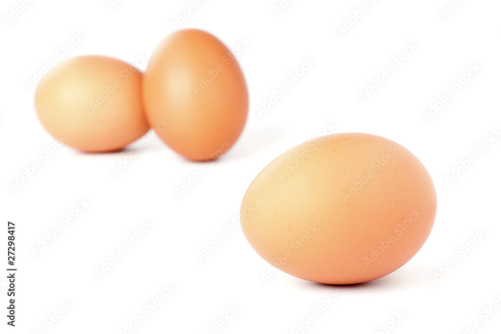 Three brown eggs isolated on white background Three brown eggs isolated on white background