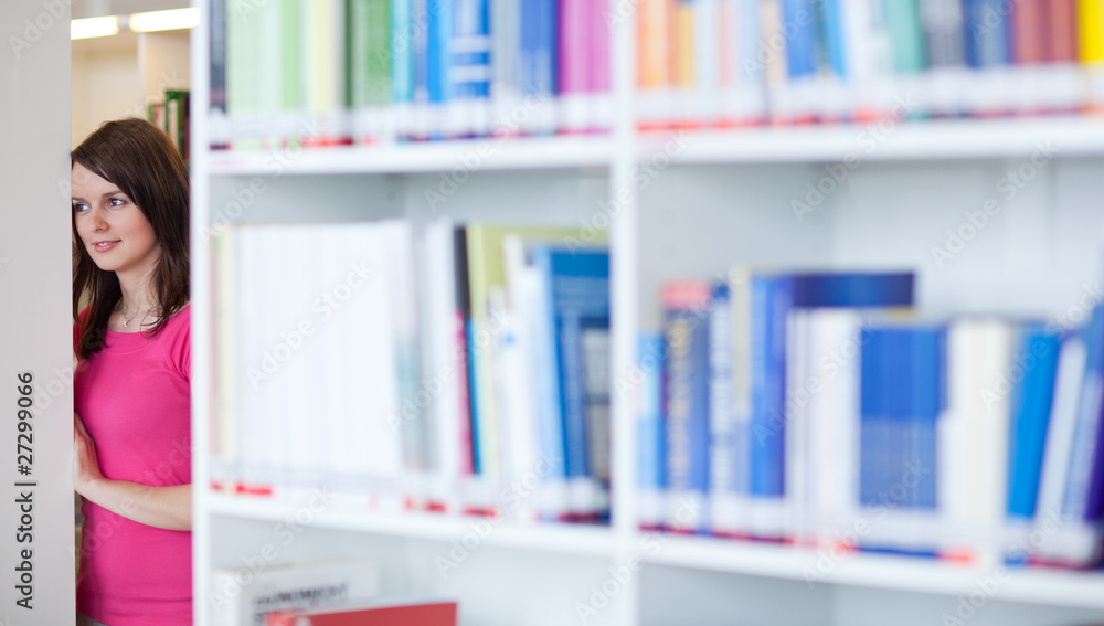 pretty young college student in an university library (shallow D pretty young college student in an university library (shallow D