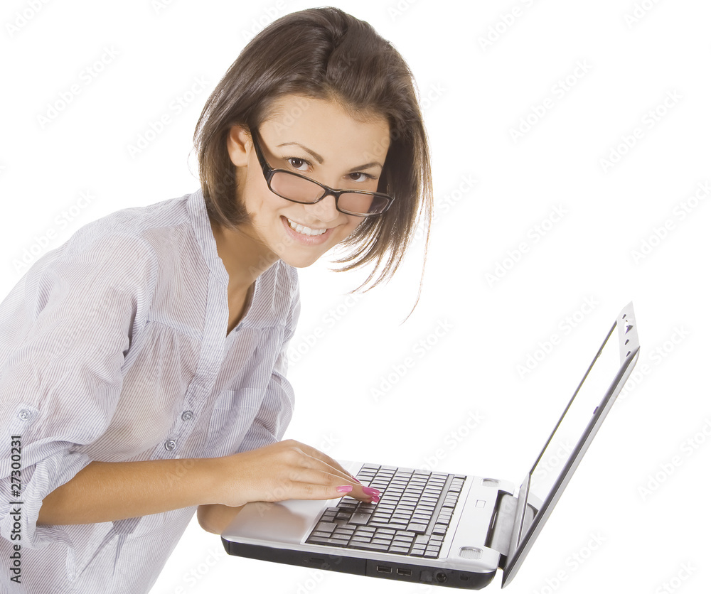 Smiling happy woman in glasses using laptop Smiling happy woman in glasses using laptop