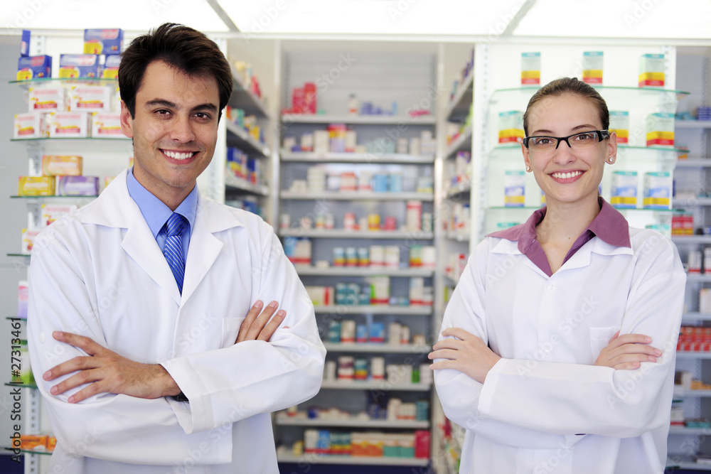 portrait of pharmacists at pharmacy