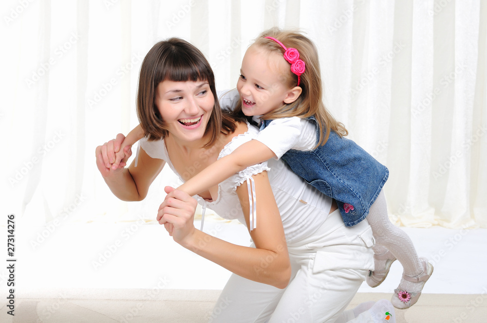 Young mother and her young daughter