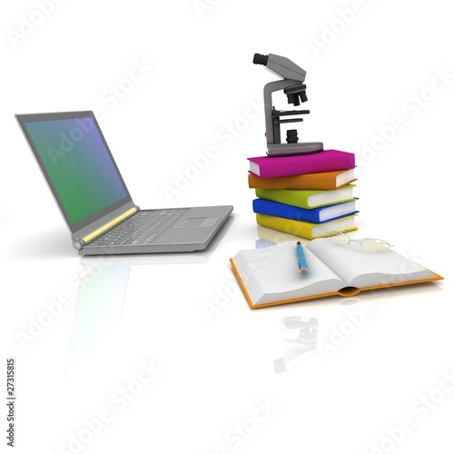 Laptop, microscope and books