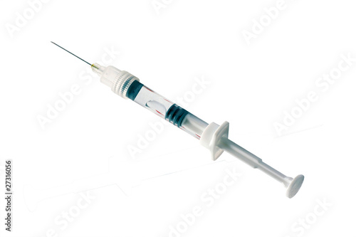 Syringe on white background
