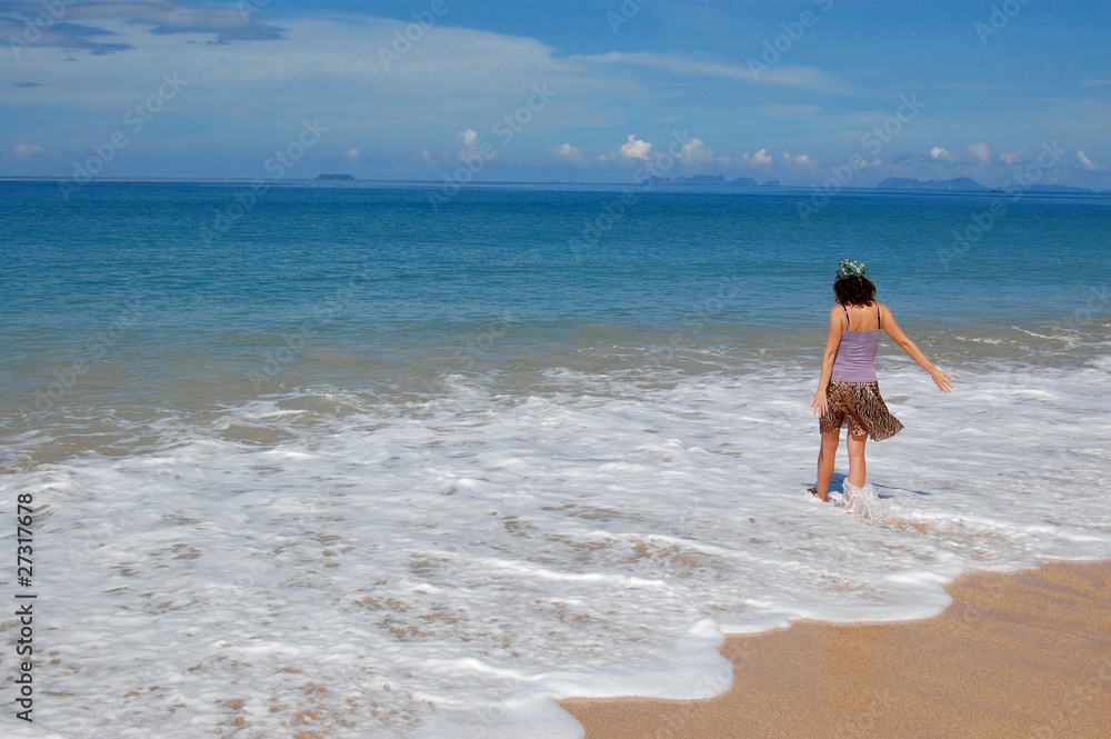 Fototapeta premium Woman on the beautiful tropical beach