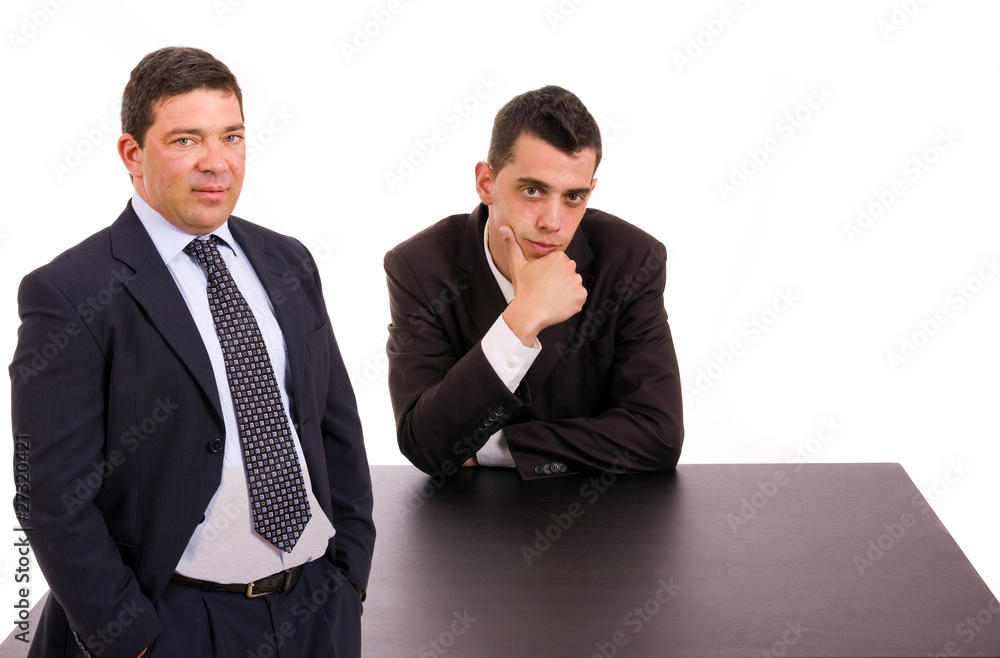 Business team portrait at a desk office Business team portrait at a desk office