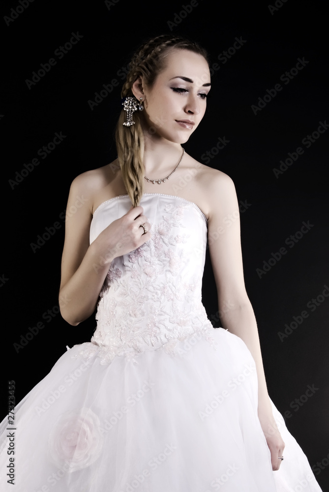 Beautiful bride isolated on black