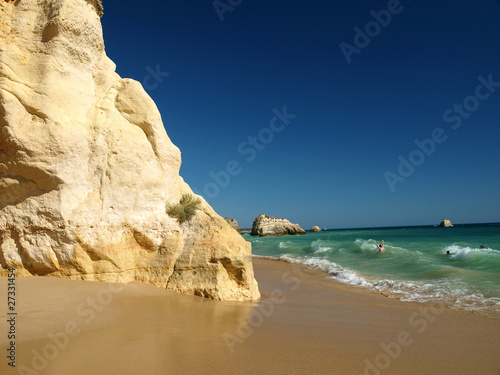 the idyllic Praia de Rocha beach on  coast of the Algarve