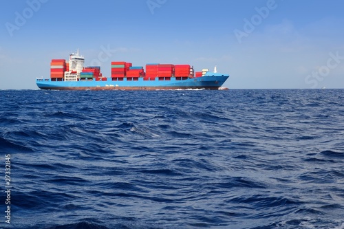 sea cargo merchant ship sailing blue ocean