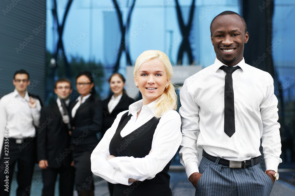 An international businessteam of five persons in formal clothes An international businessteam of five persons in formal clothes
