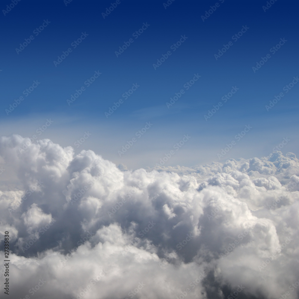 Aerial view of the beautiful blue sky with white clouds Aerial view of the beautiful blue sky with white clouds