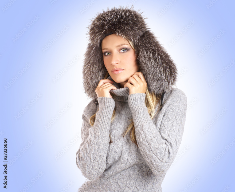 Portrait of a young and beautiful woman in a winter hat Portrait of a young and beautiful woman in a winter hat
