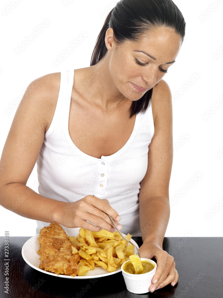 Young Woman Eating Fish and Chips. Model Released Young Woman Eating Fish and Chips. Model Released