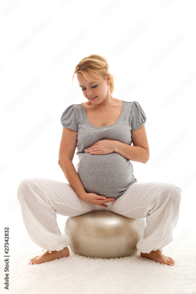 Pregnant woman admiring her belly Pregnant woman admiring her belly