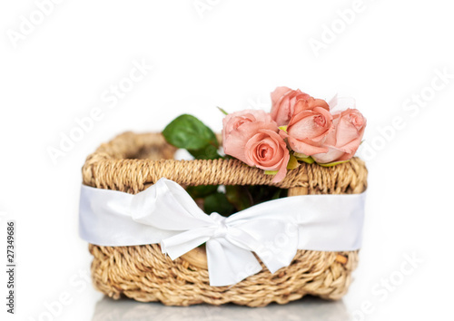 Pink roses in a basket