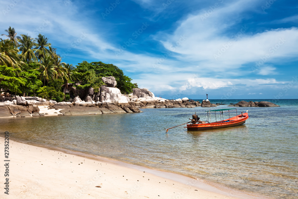 Tropical beach under blue sky. Thailand