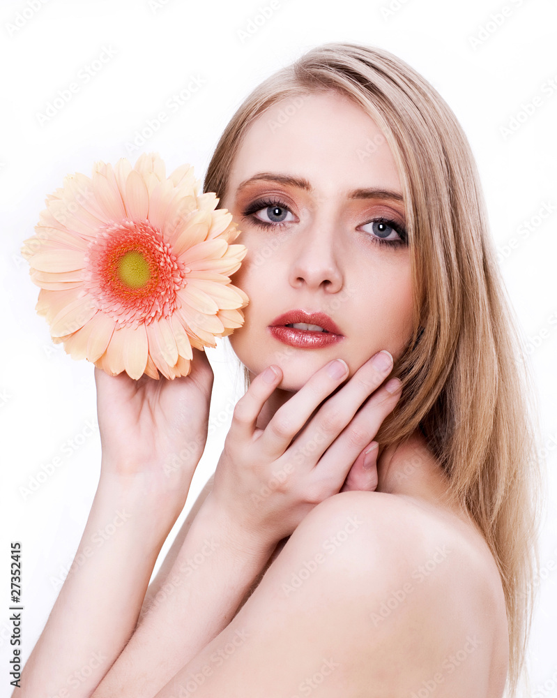 Young beautiful woman face with flower Young beautiful woman face with flower