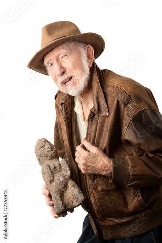 Fotografie Adventurer or archaeologist offering to sell idol