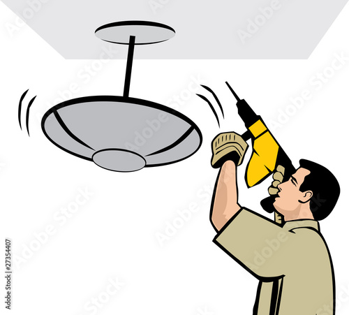 Man installing a ceiling lamp