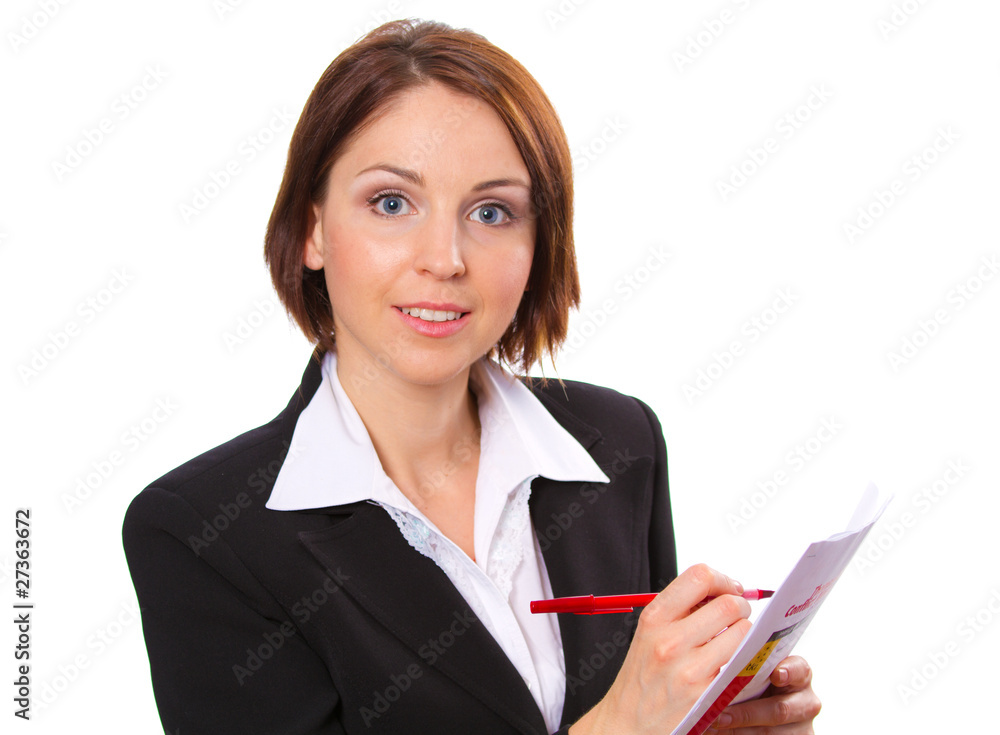 Portrait of a young attractive businesswoman taking notes Portrait of a young attractive businesswoman taking notes