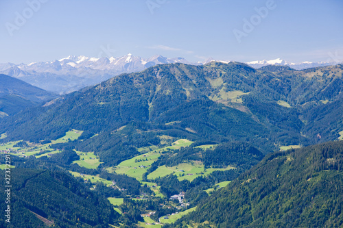 Fototapeta Naklejka Na Ścianę i Meble -  a view from the top of the alpine peak in the summertime