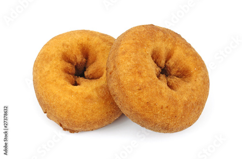 Two cake donuts on white background
