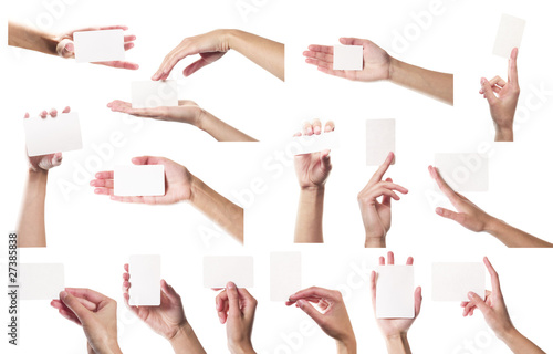 Collection of card blanks in a hand on white background