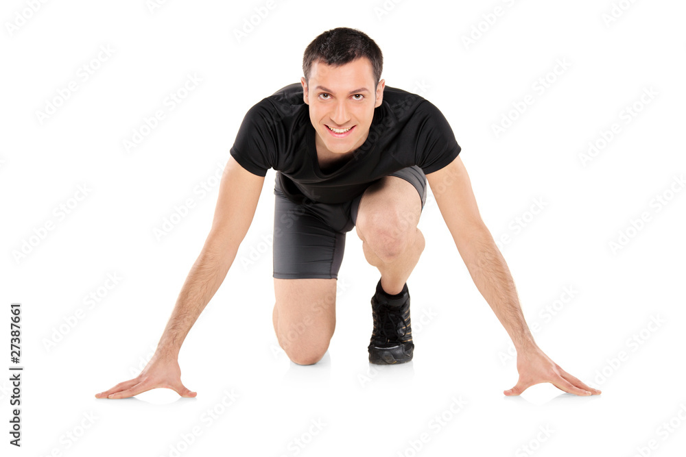 Full length portrait of a young man ready to run Full length portrait of a young man ready to run