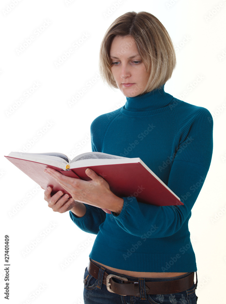 Young female reading a book on white background Young female reading a book on white background