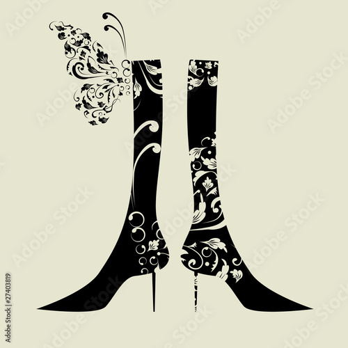 Fashion design of female boots with floral ornament