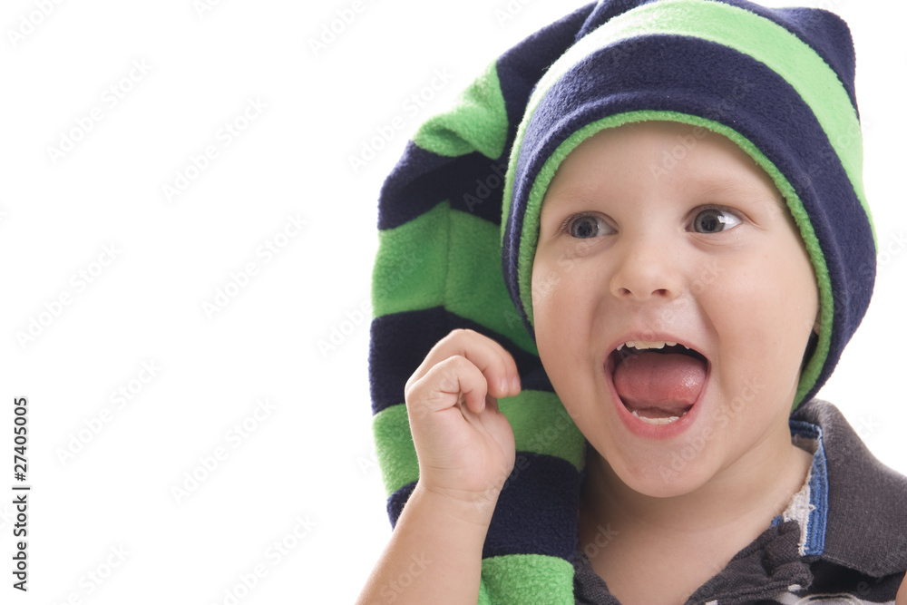 child in a green cap on the white background child in a green cap on the white background
