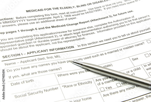 Medicaid Application and Silver Pen photo