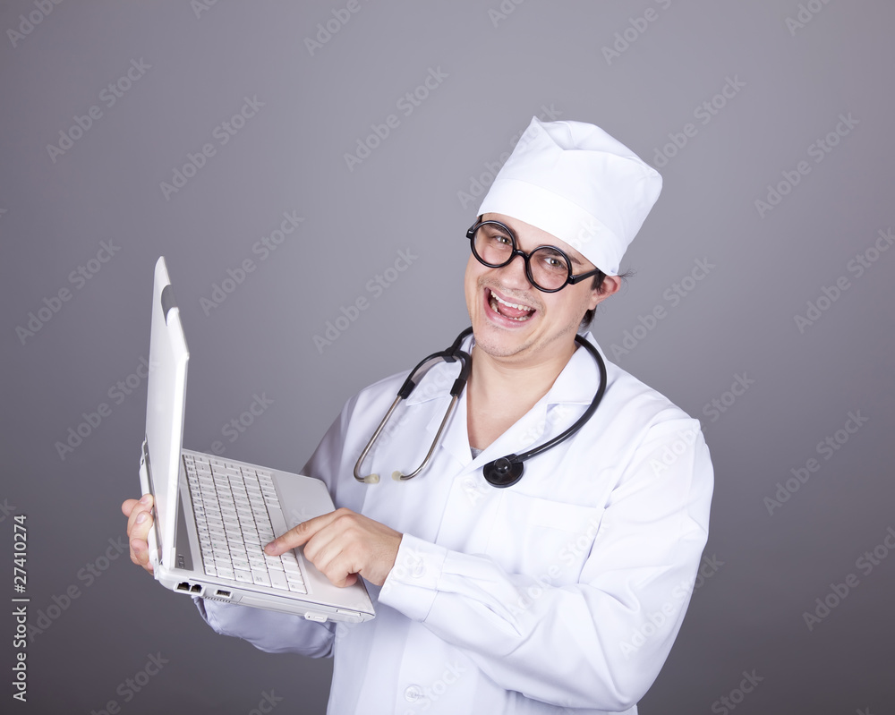 Young doctor with notebook
