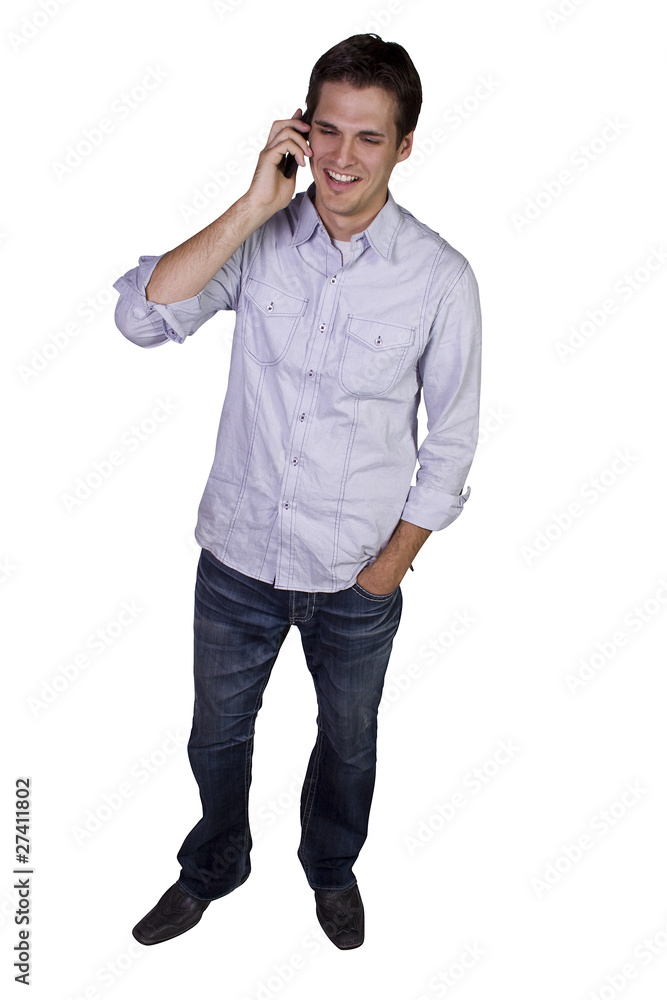 Young businessman conversing on cell phone Young businessman conversing on cell phone