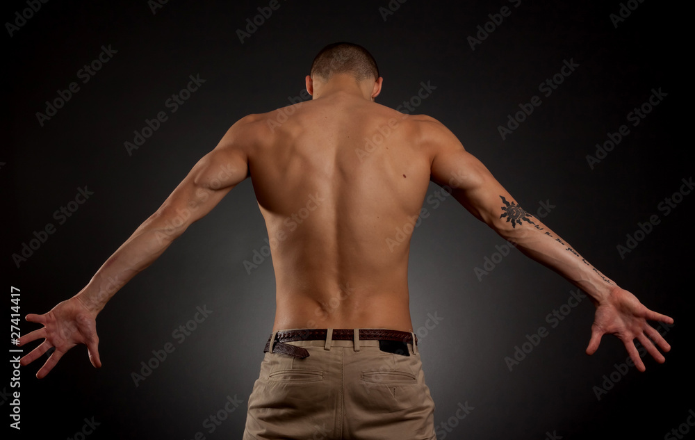 young male on a dark background young male on a dark background
