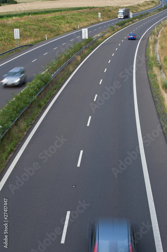 Fototapeta Naklejka Na Ścianę i Meble -  highway traffic (motion blurred image, color toned image)