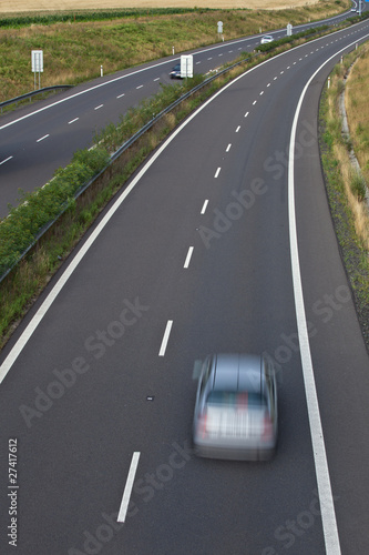 highway traffic (motion blurred image, color toned image)