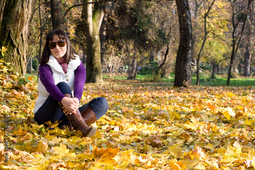 girl in autumn leaves