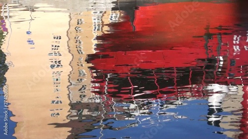 boat reflecting in water