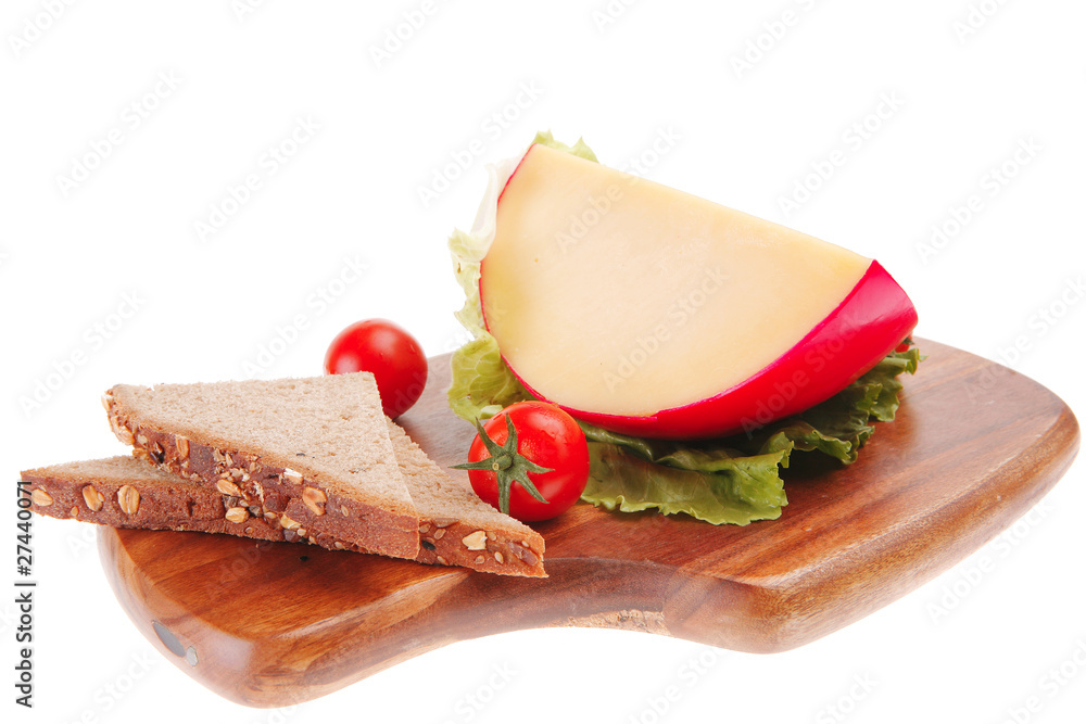 Fotografie cheese piece on sald with tomato