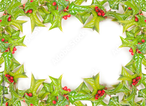 Christmas framework with holly berry isolated on white