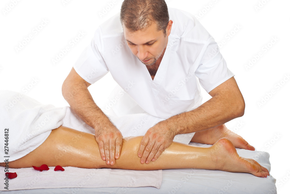 Masseur giving anti cellulite leg massage