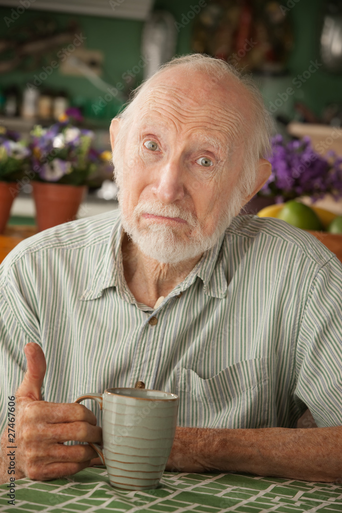Senior man with mug Senior man with mug