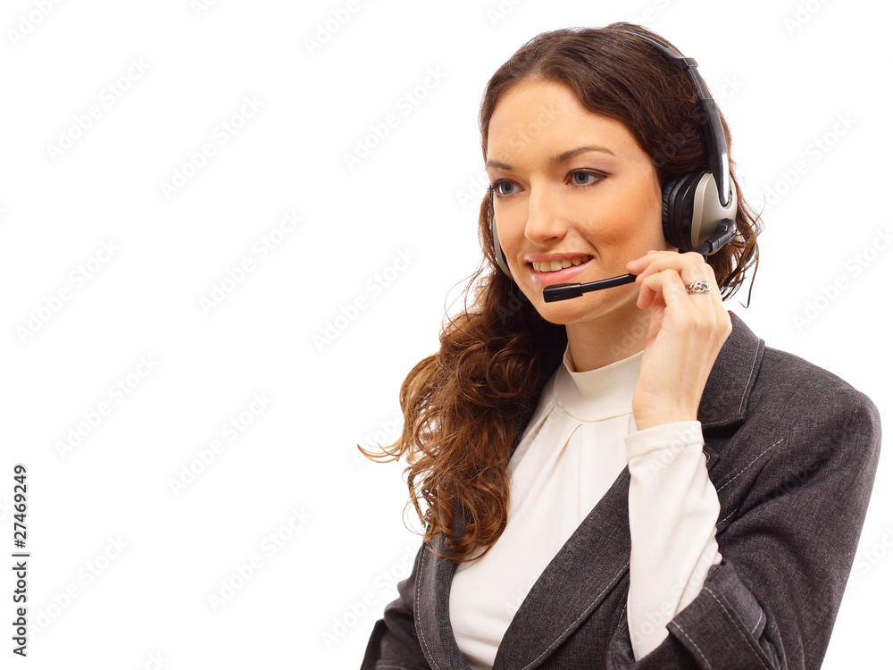 Woman wearing headset in office; could be receptionist Woman wearing headset in office; could be receptionist
