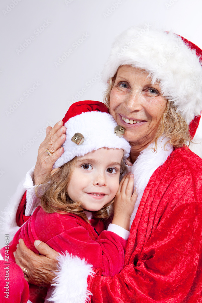 petit lutin avec mamie noël. petit lutin avec mamie noël.