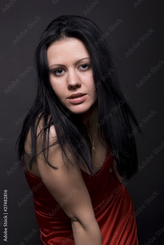 Portrait of a young seductive brunette