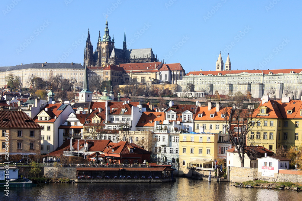 Fototapeta premium View on the autumn Prague gothic Castle above River Vltava