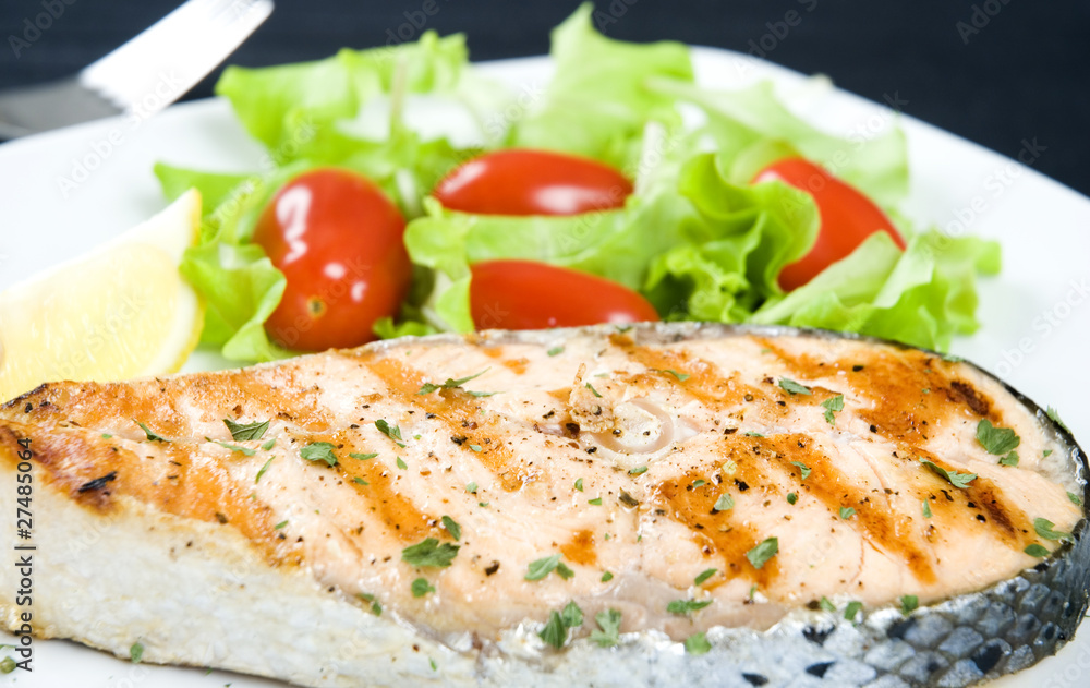 Grilled salmon fillet with fresh vegetables Grilled salmon fillet with fresh vegetables
