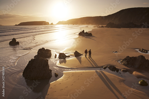 2 on the beach at sunset photo